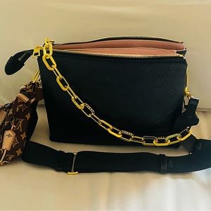 COUSSIN LEATHER HANDBAG